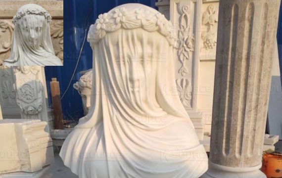 The veiled virgin statue is covered with a soft, seemingly transparent veil