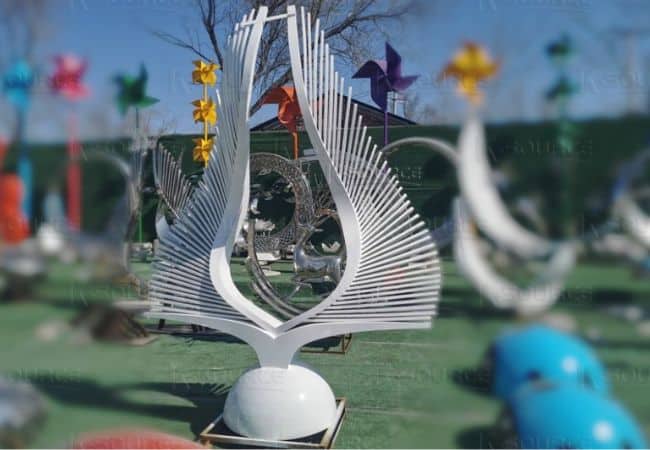 white wing sculpture