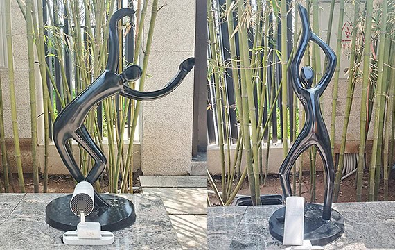 This figure sculpture looks like a dancing female dancer.