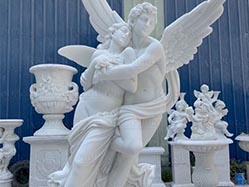 Pyramid three-dimensional concept of Cupid and Psyche embracing