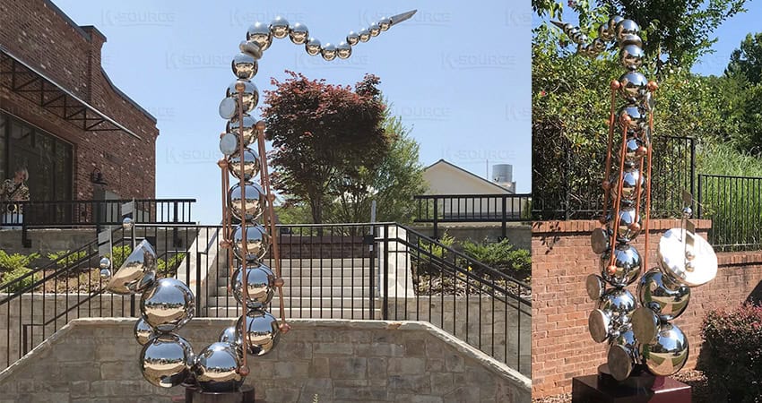 Metal sculptures with spherical mirrors can have a three-dimensional effect
