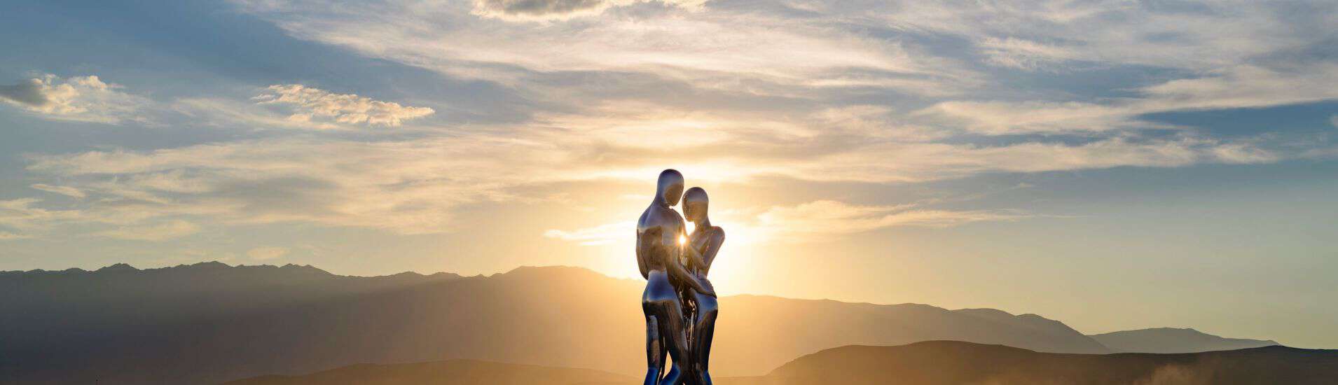 Modern stainless steel sculpture, couple hugging sculpture
