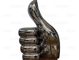 Positive thumbs up mirror sculpture