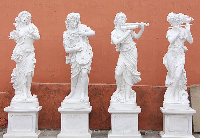 Marble sculptures of four goddesses performing music