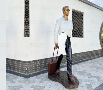 Bronze Traveler in White Shirt
