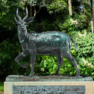 Bronze sculpture of a twisting horn antelope