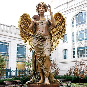 Bronze angel statue in gold color